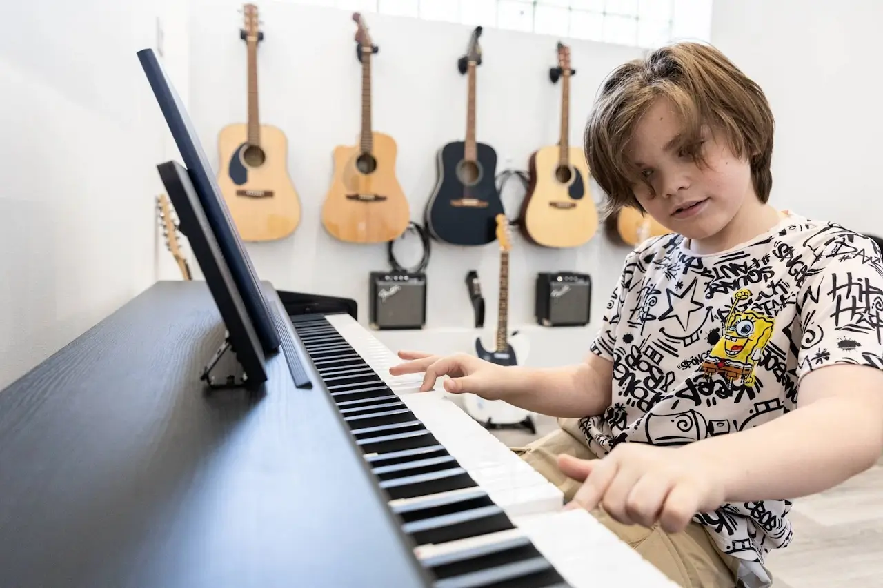 A young person working on a practical activity with an instructor at YoungEducation
