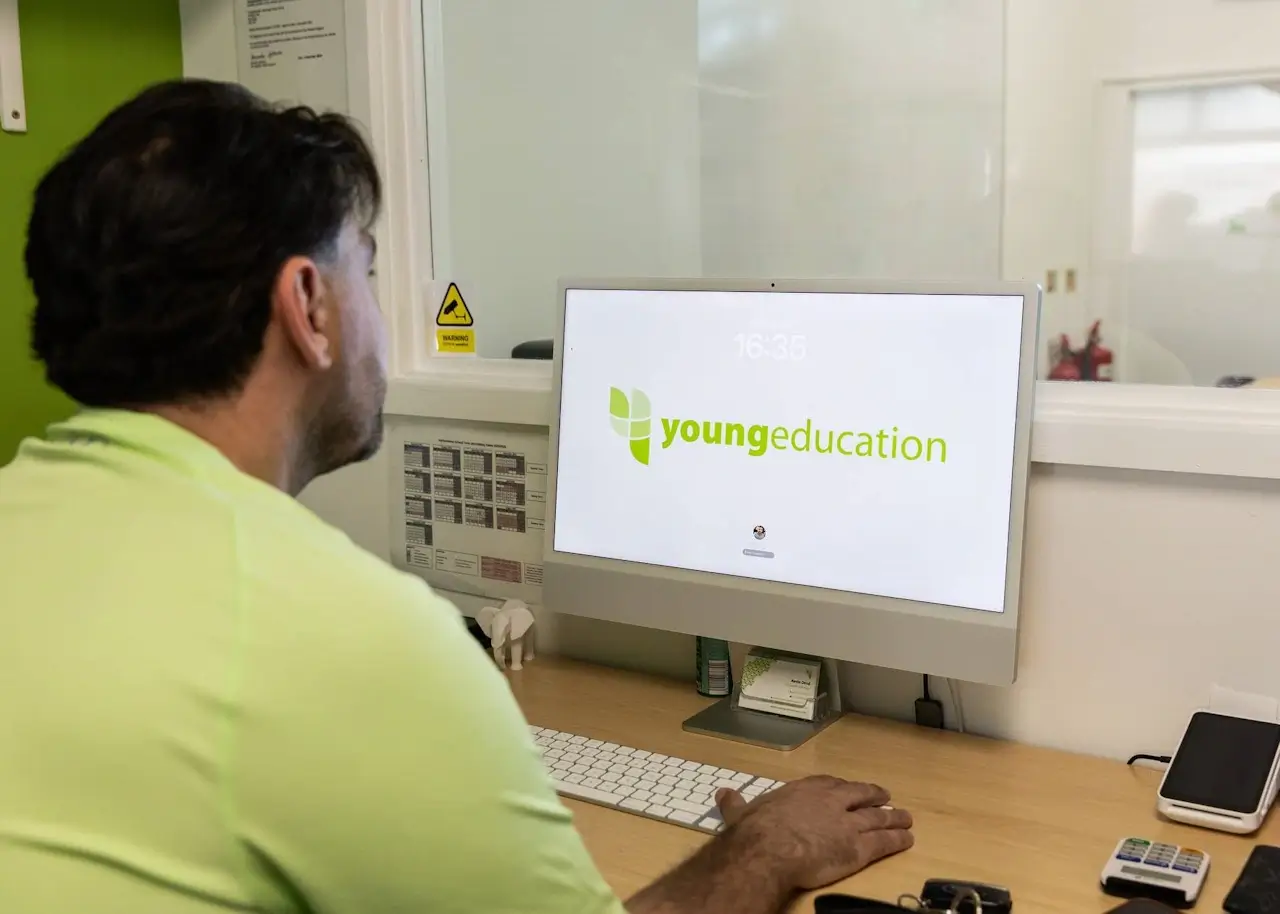 A learner taking part in a live online tuition session at home