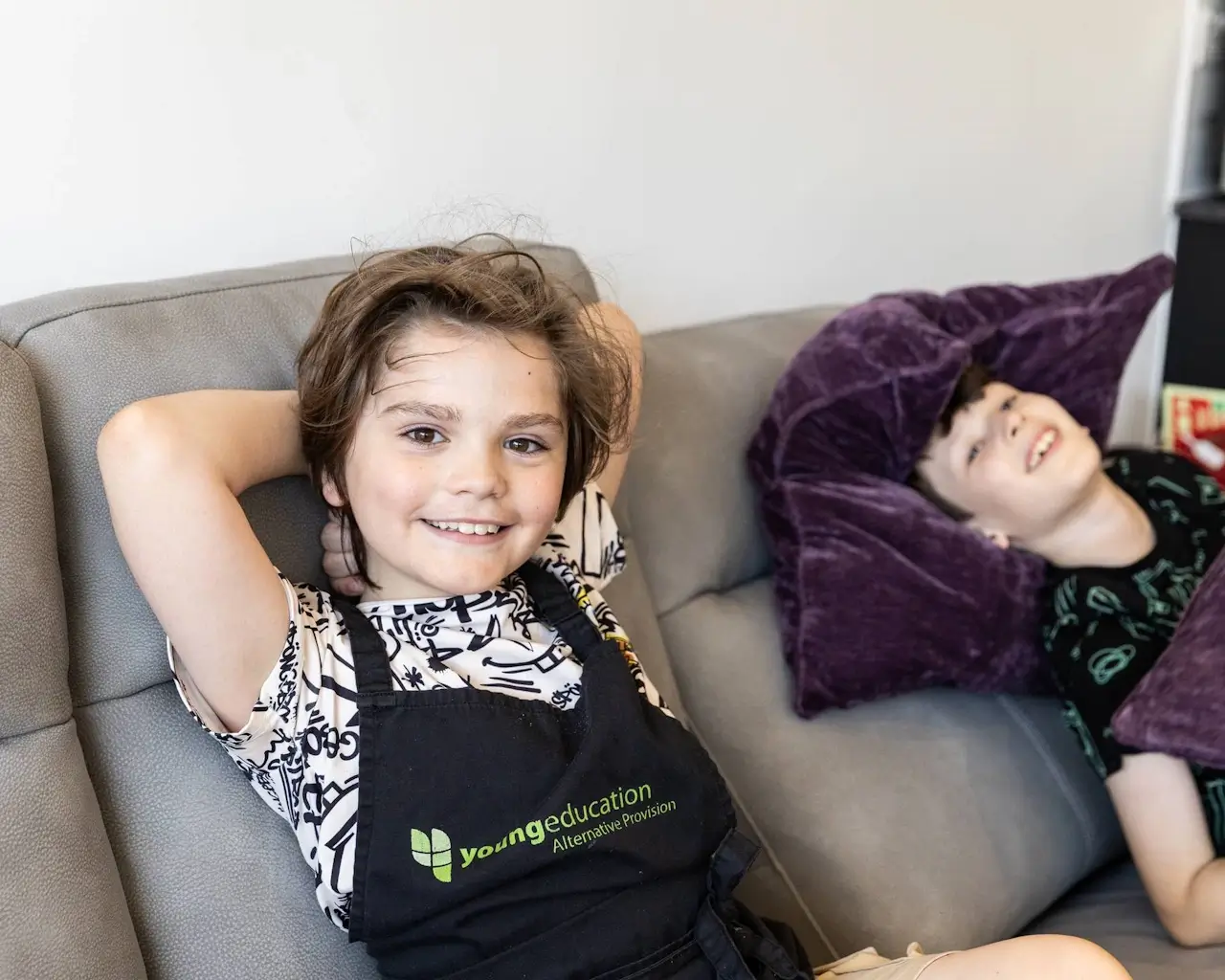 A YoungEducation staff member supporting a young person